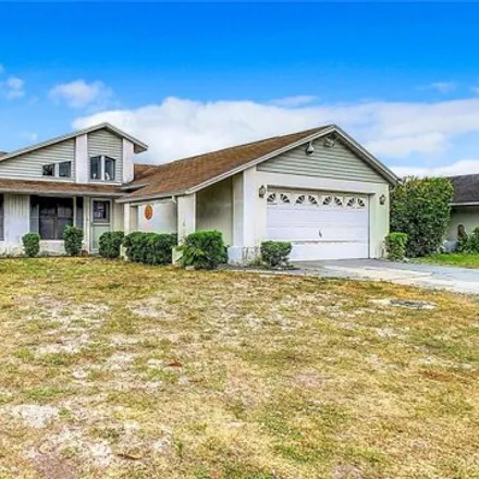 Buy this 3 bed house on 7644 Limington Drive in Jasmine Estates, FL 34668