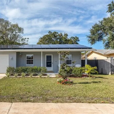 Rent this 4 bed house on 3116 Winchester Dr in Dunedin, Florida