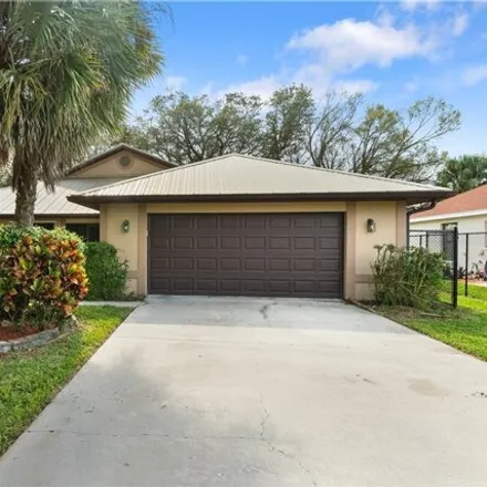 Buy this 3 bed house on 1823 Golfside Village Drive in Lehigh Acres, FL 33936
