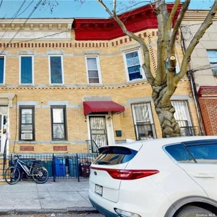 Buy this 6 bed house on 54-33 Arnold Avenue in New York, NY 11378