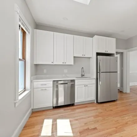 Rent this 4 bed apartment on 19 Taft St Apt 3 in Boston, Massachusetts