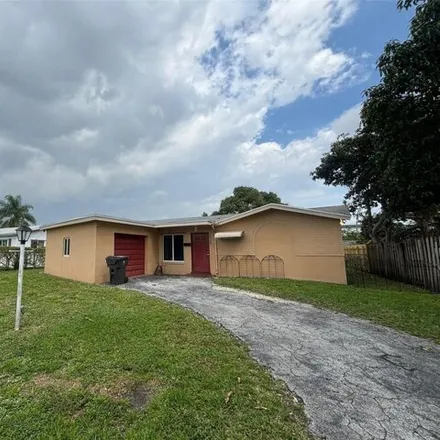 Buy this 3 bed house on 4168 Northwest 45th Terrace in Lauderdale Lakes, FL 33319