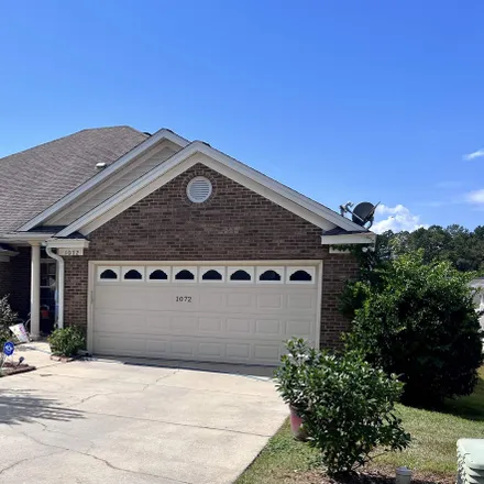 Buy this 3 bed townhouse on 1074 Kingdom Court in Tallahassee, FL 32311