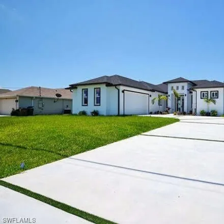 Buy this 4 bed house on 1366 Northeast Juanita Place in Cape Coral, FL 33909