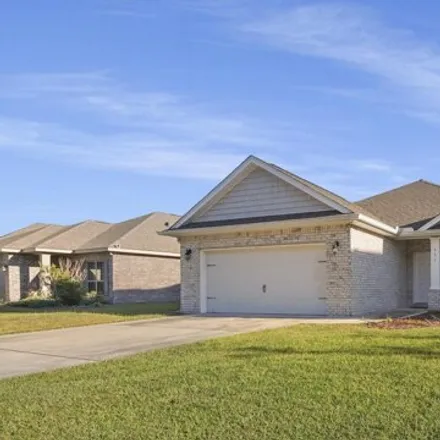 Rent this 4 bed house on 531 Cocobolo Drive in Santa Rosa Beach, FL 32459