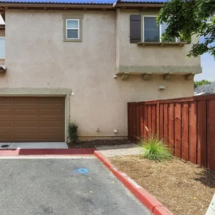 Rent this 4 bed house on 4032 Alicia Court in Riverside, CA 92501