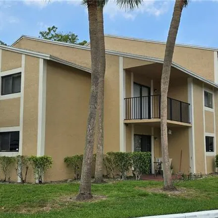 Rent this 2 bed apartment on 9491 Palm Cir S