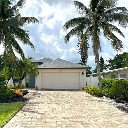 Rent this 3 bed house on 10679 8th Street North in Collier County, FL 34108
