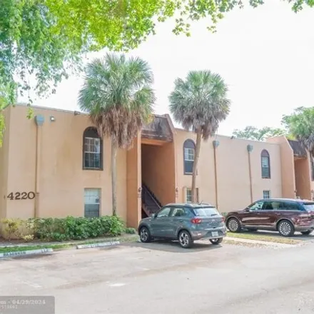 Buy this 1 bed condo on Hidden Forest in Lauderhill, FL 33313