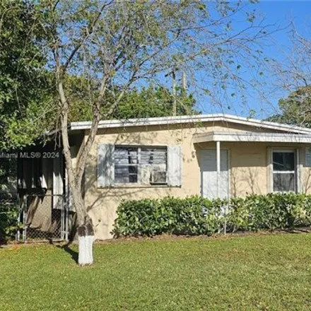 Buy this 3 bed house on 155 NW 30th Ter in Fort Lauderdale, Florida