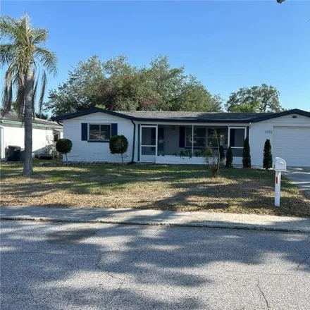 Buy this 3 bed house on 5332 Bob White Dr in Holiday, Florida