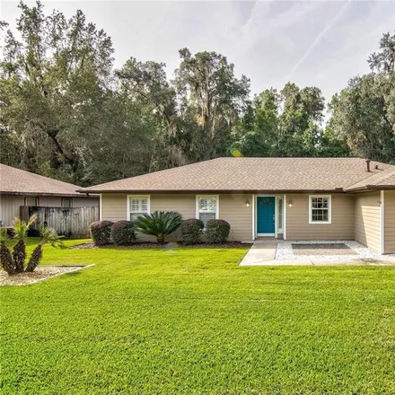 Buy this 4 bed house on 6022 Northwest 4th Place in Gainesville, FL 32607