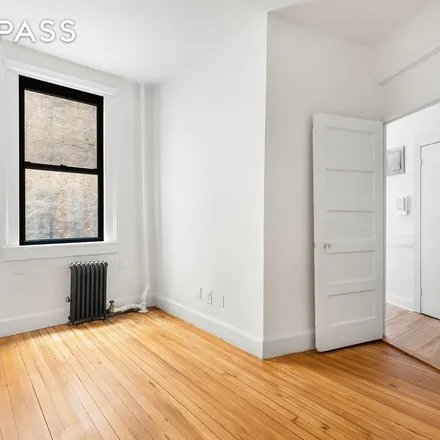 Rent this 2 bed apartment on St. Anthony of Padua Church in 154 Sullivan Street, New York