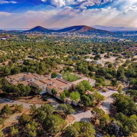 Buy this 4 bed house on 38 Apache Ridge Road in Santa Fe County, NM 87505