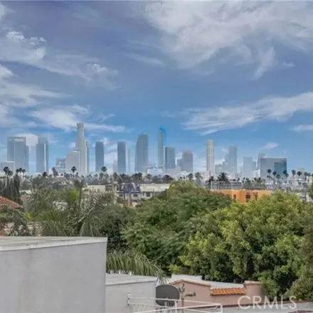 Rent this 3 bed apartment on 739 North Gramercy Place in Los Angeles, CA 90038