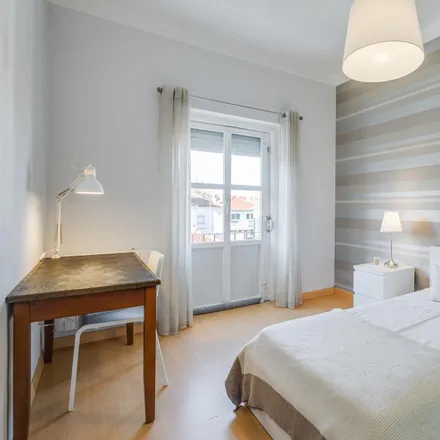 Rent this 3 bed room on Rua Marquês de Olhão in 1900-194 Lisbon, Portugal