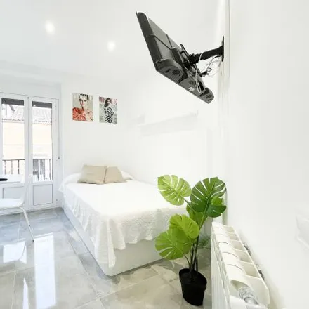 Rent this 4 bed room on Indalo Tapas in Calle de San Marcos, 7
