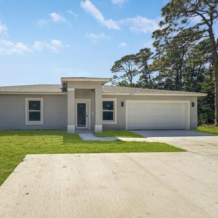 Buy this 3 bed house on 2484 Southwest Bayshore Boulevard in Port Saint Lucie, FL 34984
