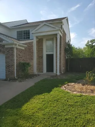 Rent this 2 bed townhouse on 1501 Maybrook Court in Arlington, TX 76014