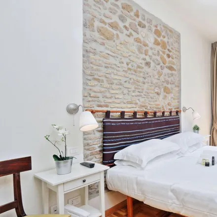 Rent this 1 bed apartment on Tien Tsin in Via di Capo le Case, 55