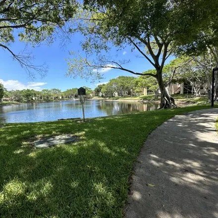 Rent this 2 bed condo on 641 Cypress Lake Blvd Apt P in Deerfield Beach, Florida