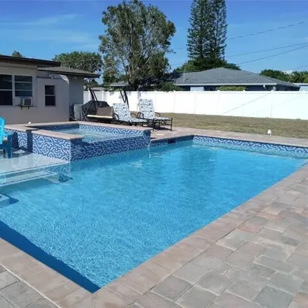 Rent this 3 bed house on 4579 Southeast 9th Place in Cape Coral, FL 33904