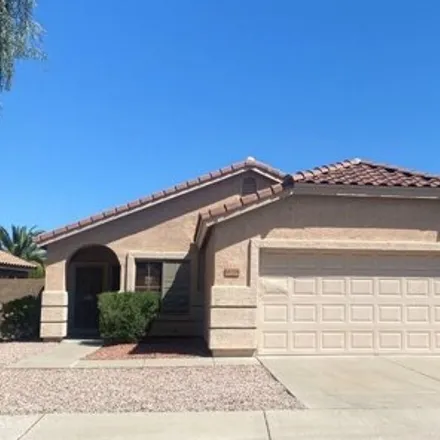 Rent this 3 bed house on 14706 West Ely Drive in Surprise, AZ 85374