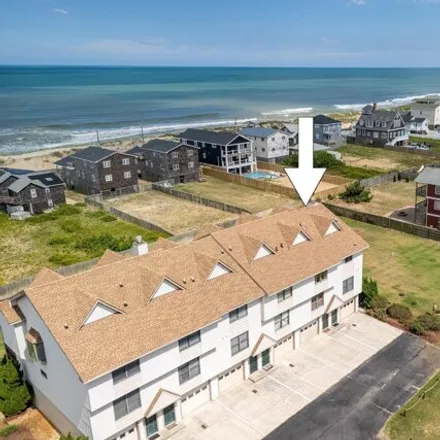 Buy this 2 bed townhouse on 3836 North Virginia Dare Trail in Kitty Hawk, NC 27949