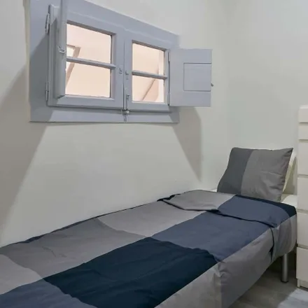 Rent this 7 bed room on Rua Cristóvão Falcão in 1900-172 Lisbon, Portugal