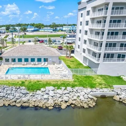 Rent this 2 bed condo on 1805 Riverside Dr Unit 507n in Titusville, Florida