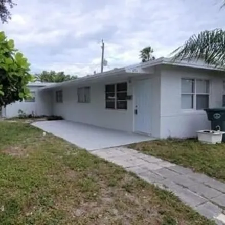 Rent this 3 bed house on 687 Northeast 46th Court in Coral Heights, Oakland Park