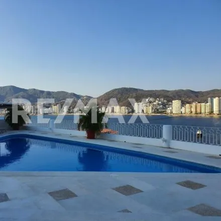 Rent this 5 bed house on Cañada de las Palmas in Playa Guitarrón, 39300 Acapulco