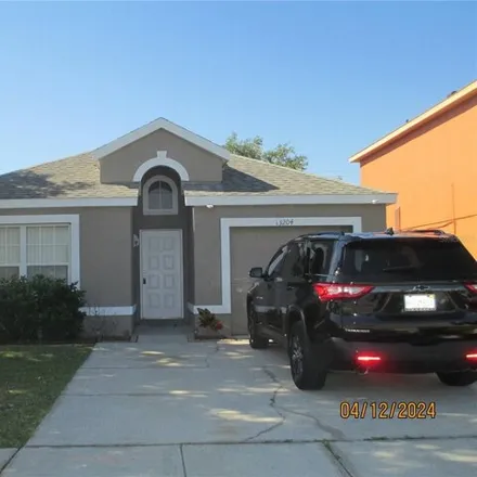 Rent this 3 bed house on 13220 Glenbarrow Court in Meadow Woods, Orange County