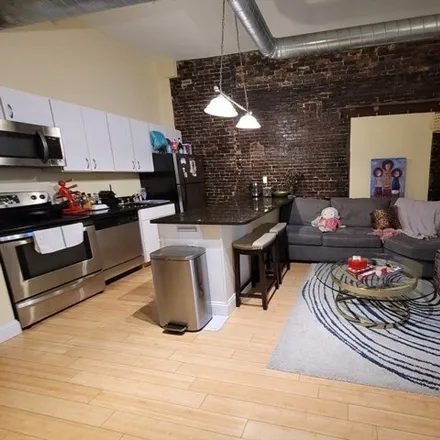 Rent this 3 bed apartment on 37 Temple Pl Apt 402 in Boston, Massachusetts