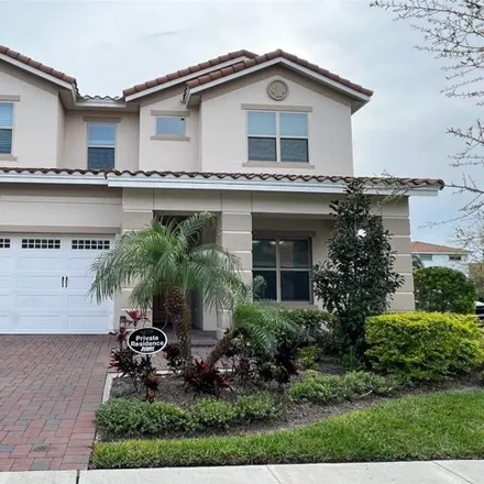 Rent this 4 bed house on Woodrow Drive in Orange County, FL 32832