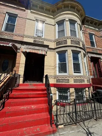 Buy this 5 bed house on 60-71 67th Avenue in New York, NY 11385