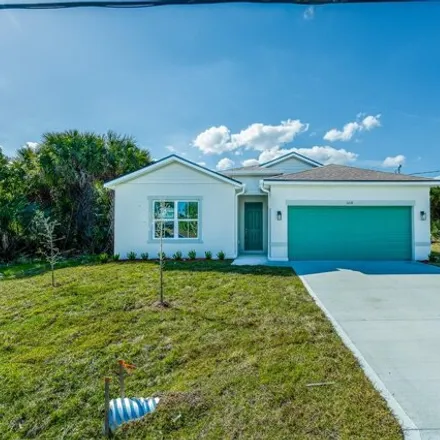 Buy this 4 bed house on 3230 Lakeland Avenue in Palm Bay, FL 32908