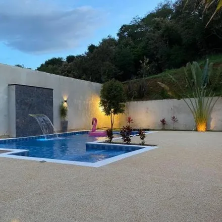 Buy this 4 bed house on unnamed road in Vila de São Fernando, Jandira - SP