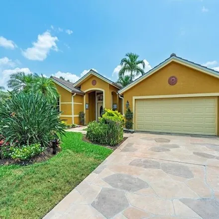 Rent this 4 bed house on 918 Marble Drive in Collier County, FL 34104