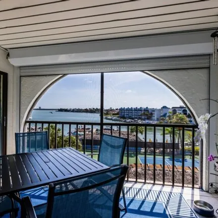 Buy this 1 bed condo on 977 Anglers Cove in Marco Island, FL 34145