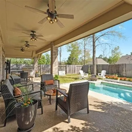 Rent this 4 bed house on 105 S Carson Cub Ct in Montgomery, Texas