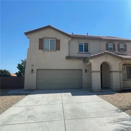 Rent this 4 bed house on 14869 Coachman Road in Victorville, CA 92394
