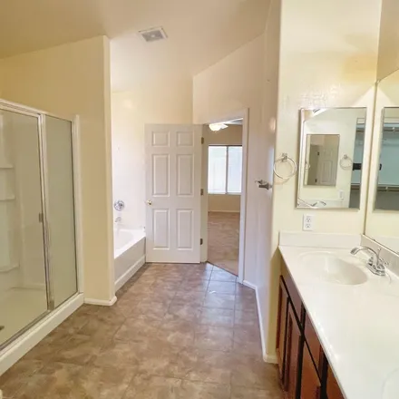 Rent this 3 bed apartment on 4913 West Novak Way in Phoenix, AZ 85399