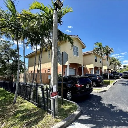 Rent this 3 bed townhouse on 2299 Washington Street in Hollywood, FL 33020