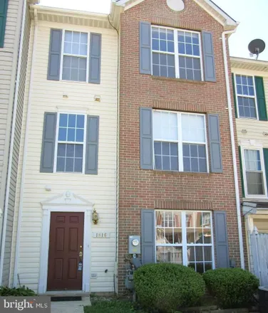 Rent this 3 bed townhouse on 1816 Triple Feather Road in Meade Village, Severn