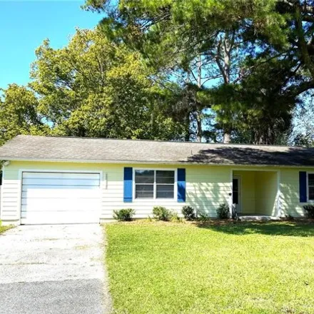 Buy this 2 bed house on Northwest 60 Drive in Alachua, FL 32615