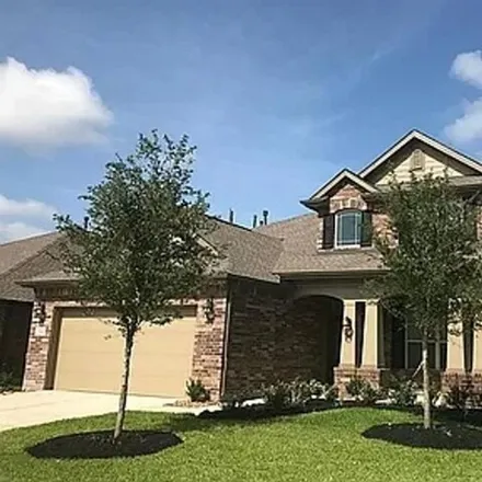 Rent this 4 bed house on Narrow Peak Drive in Harris County, TX 77377