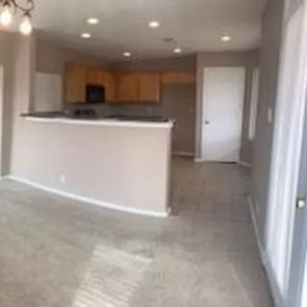 Rent this 4 bed house on 1390 Penasco Road in Rio Rancho, NM 87144