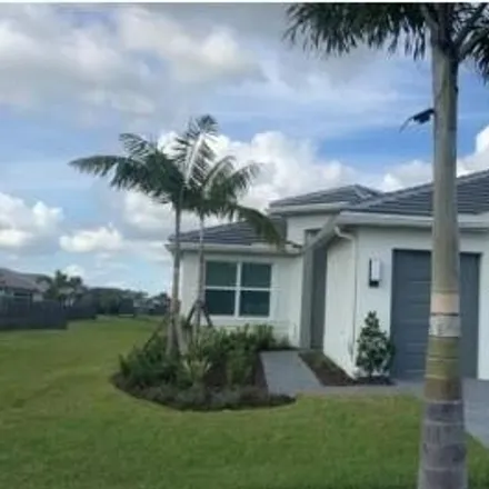 Rent this 4 bed house on Southwest Poseidon Way in Port Saint Lucie, FL 34987