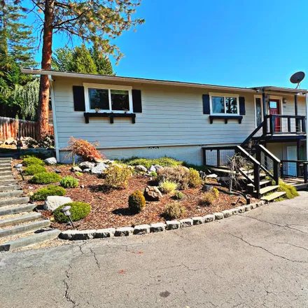 Buy this 4 bed house on 1586 Angel Crest Drive in Medford, OR 97504